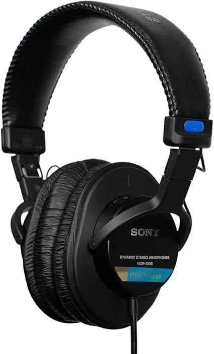 Sony MDR-7506 professional studio headphones with black padded over-ear cups, adjustable headband with cushioned padding, and blue accent button on the headband.