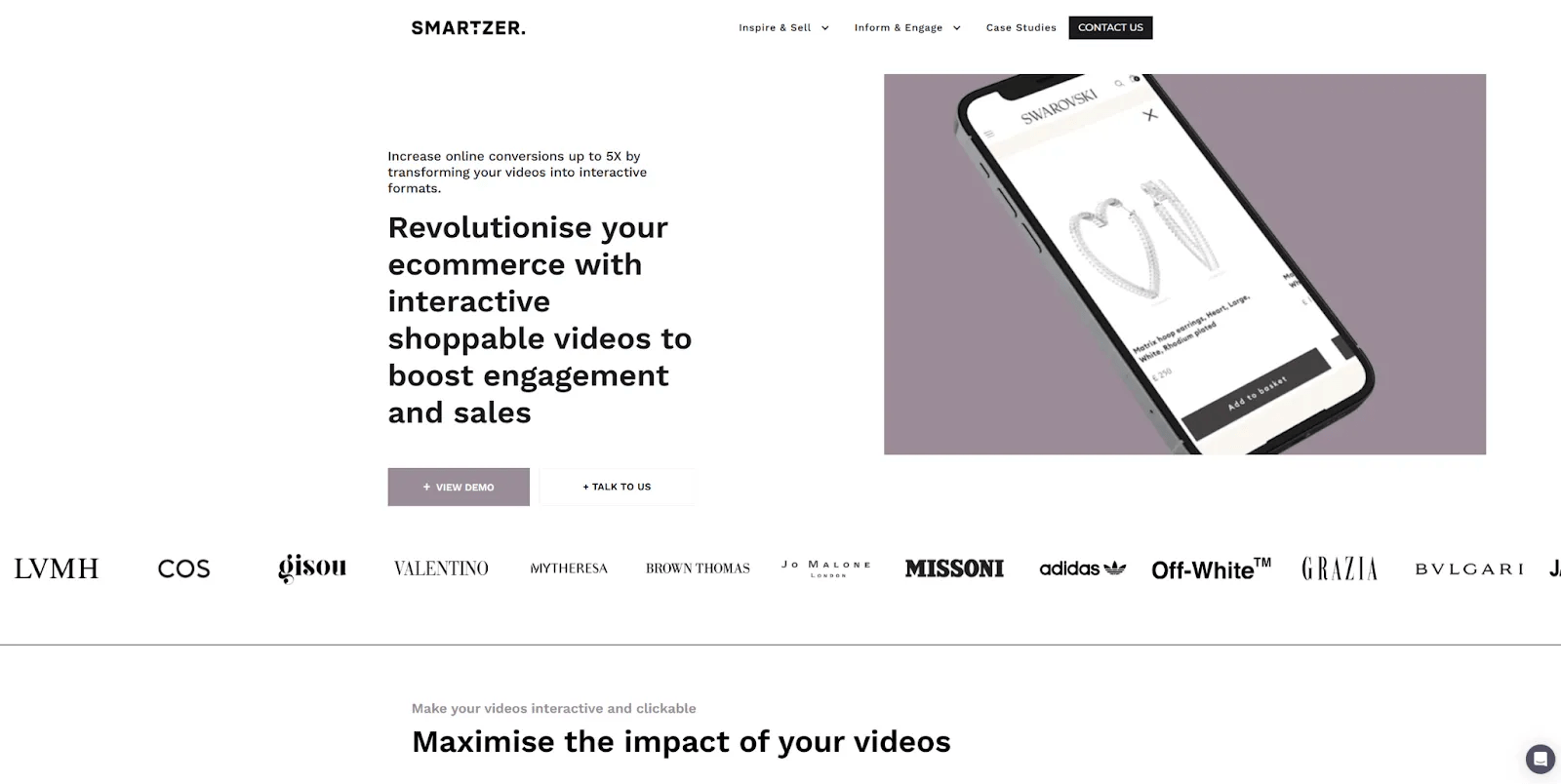 The Smartzer homepage begins with a demo of shoppable videos on various mobile devices