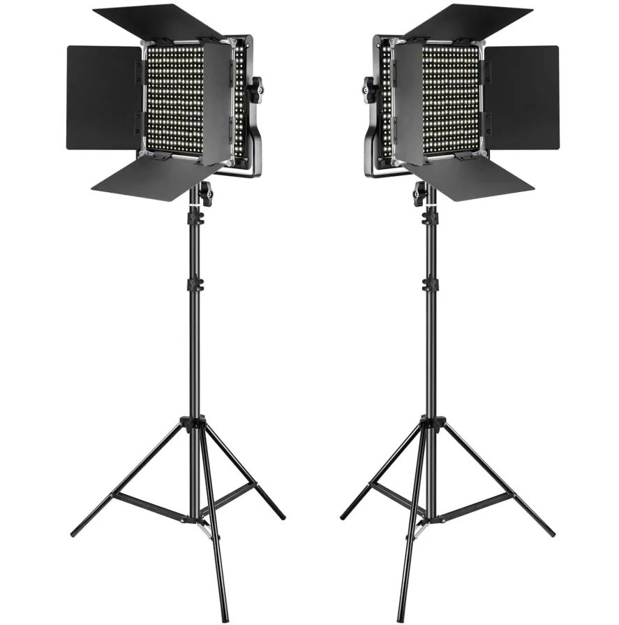 Pair of Neewer LED panel lights on adjustable tripod stands, each with four barn doors for light direction control, designed for video or photography studio lighting.
