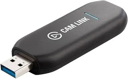 Elgato Cam Link 4K capture device, a compact USB dongle for connecting DSLR and mirrorless cameras to computers for live streaming.