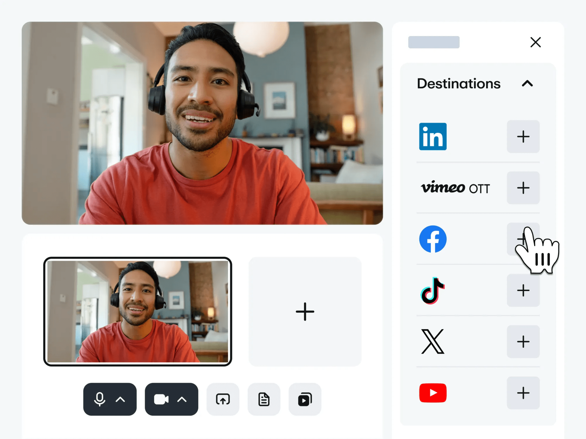 Man live streaming from his computer wearing headphones and simulcasting to Facebook